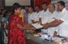 KMDCL distributes cheques among Christian beneficiaries